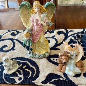 Angel Figurine with Child and Lion